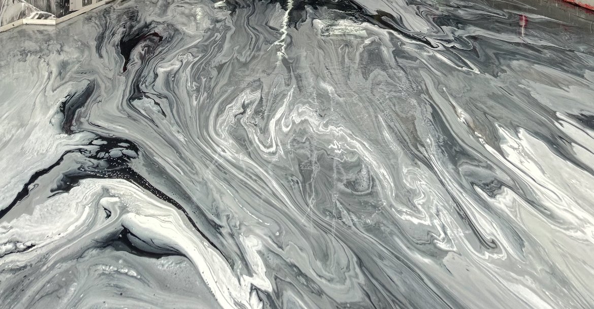Silver, white and black marbled metallic epoxy floor
