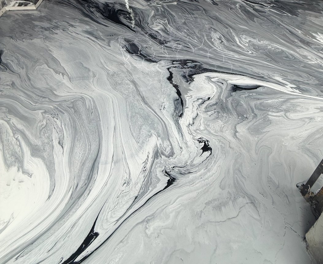 Grey and white marbled metallic epoxy floor