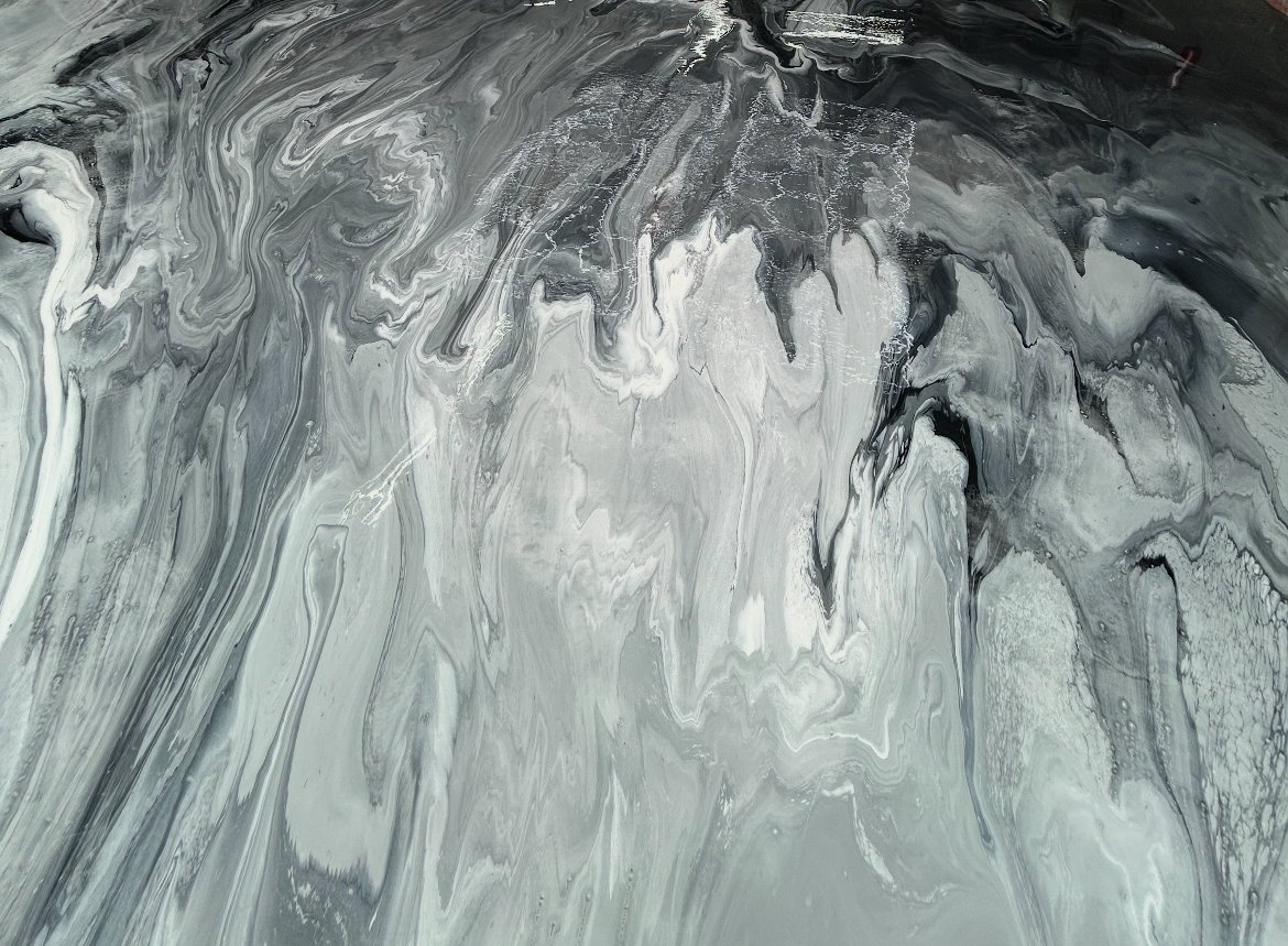Black, white and grey marbled metallic epoxy floor
