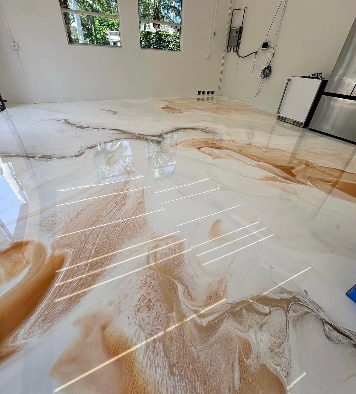 Copper metallic epoxy floor in a finished living space