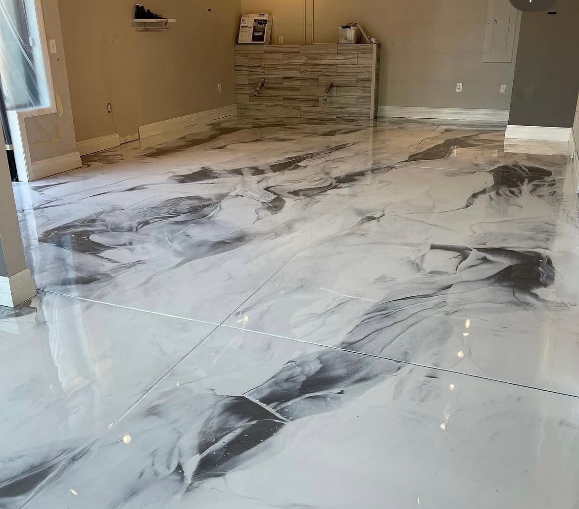 Monochrome metallic epoxy floor in a commercial space