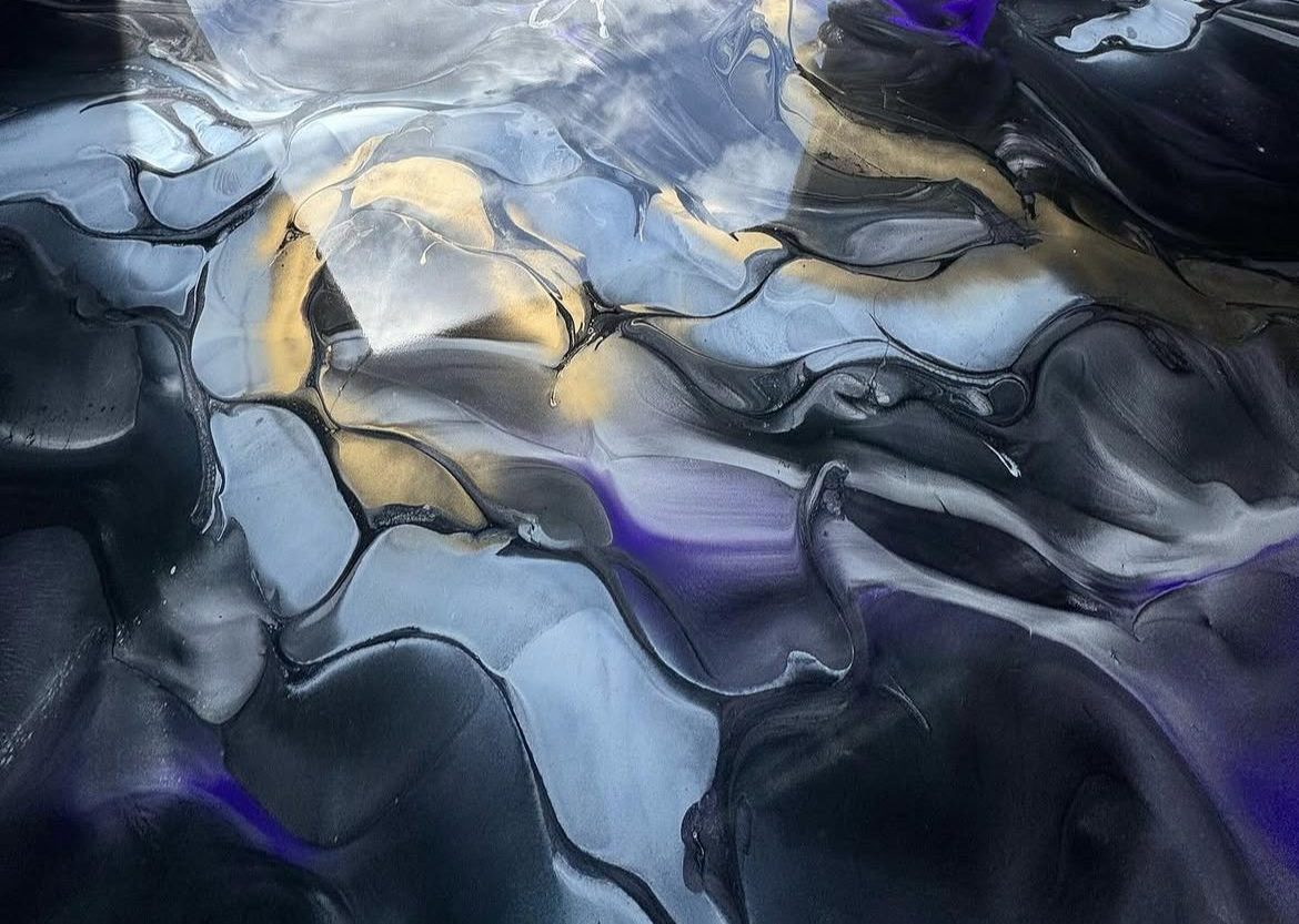 Purple, gold and black metallic epoxy floor